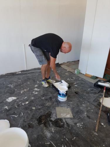 Jacques painting cupboards