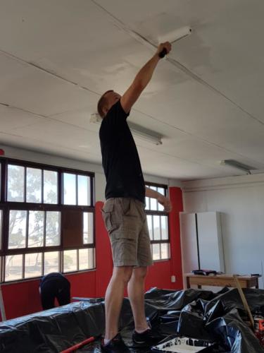 Johan painting the ceiling
